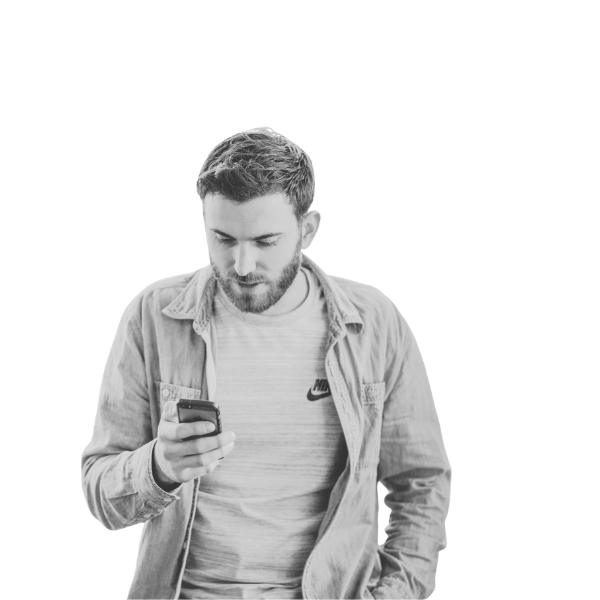 Man checking his phone, arms crossed
