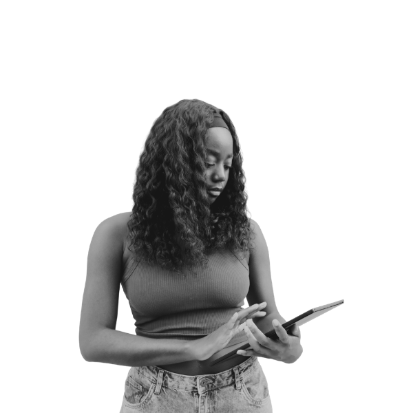 Woman with curly hair holding a tablet